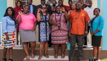 PM Harris congratulates NHC staff, calls for more development